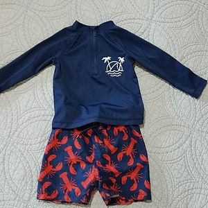 Long sleeve rash guard and swim trunks